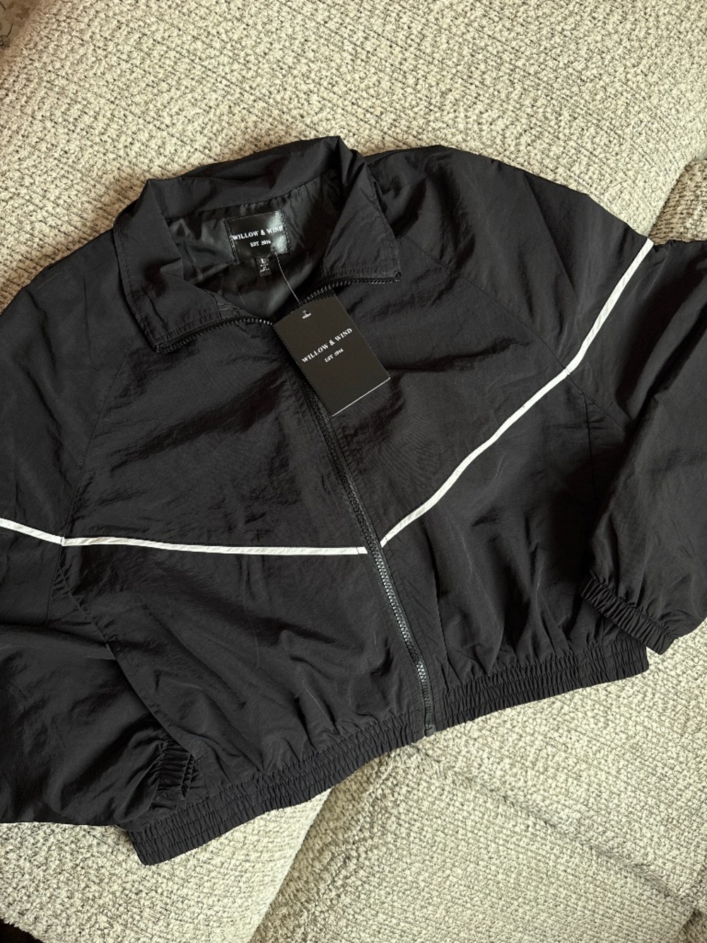 Black cropped windbreaker jacket with white piping